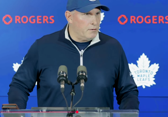 Craig Berube speaks to reporters pregame before the Maple Leafs’ game against the Calgary Flames.